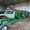 JOHN DEERE 9750 STS WITH 936D 36 FOOT DRAPER FRONT ON TRAILER FOR SALE