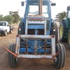 Ford 7700 Tractor with Forks