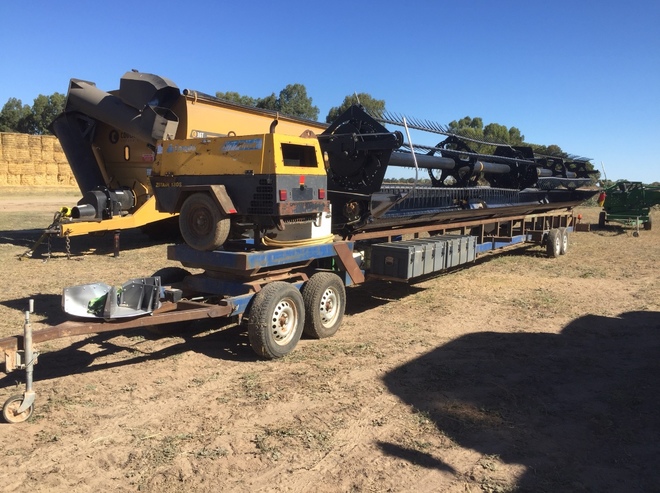 Under Auction - 2009 John Deere 9870 STS Header with 2010 MacDon D60 45ft Front - 2% Buyers Premium On All Lots 