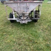 trailing belt spreader