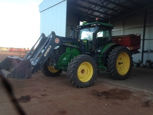 7230R John Deere Tractor and Loader