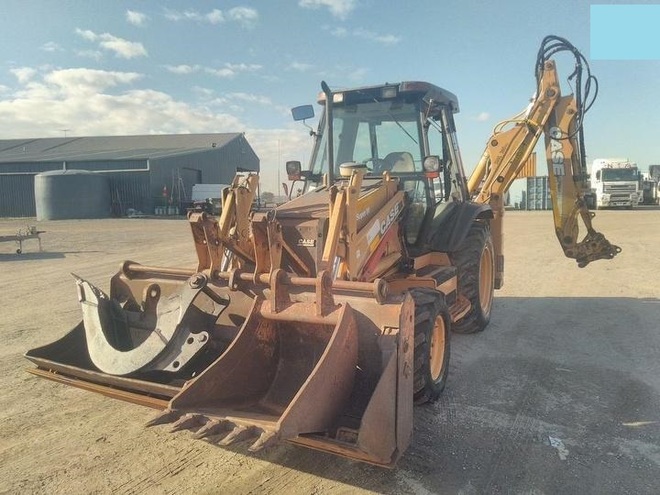 4x4 Case 580 Super M Backhoe loader with buckets and trenching  attachment with a/c cabin and extenderhoe on rear