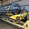 CX 860 New Holland Harvestor with 40' Honeybee Draper Front & Trailer