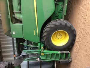 John Deere S660 with or without 630D platform and trailer.