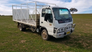 2006 Isuzu NPR200 Truck and Crate
