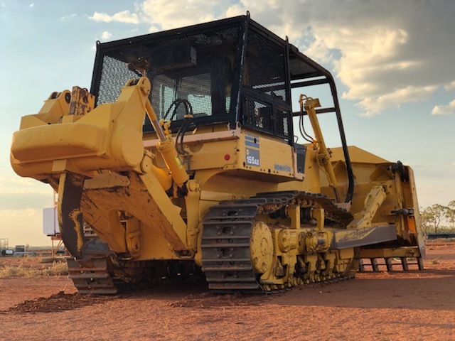Komatsu Bulldozer with Gessner Stick rake and tree spear