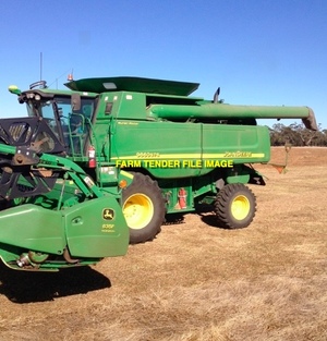 John Deere STS 9660 with 2006 930D JD Front & Cross Auger on Kieth 3 axle trailer