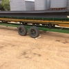 John Deere 930 Flex Front , Lentil Reel , and Finger Reel , on a good Comb Trailer 