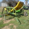 Hustler 4000 Round  and Square Bale Hay Feed out Machine . 