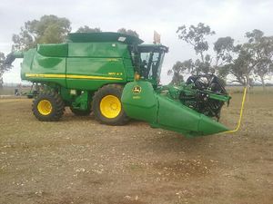 Used John Deere 9870 STS with 640D Draper Front