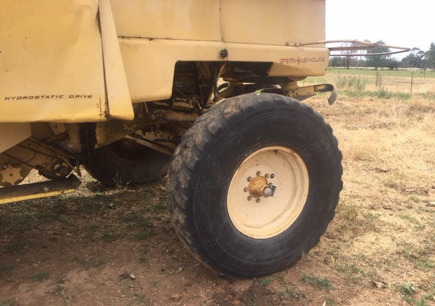 New Holland TR85 Header Harvester (In working Condition) + one available for parts (front & trailer included)