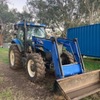 2011 New Holland 6050 Tractor with FEL & Bucket