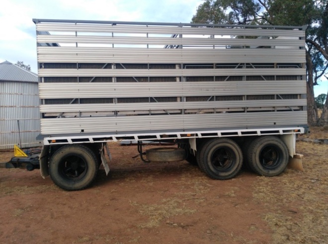 2016 20' 3x1 Stock Crate on a Marlin Tri Axle Dog Trailer