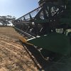 John Deere 630F Flex Front with Comb Trailer