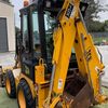 JCB 1cx Skidsteer backhoe loader, with 4in 1 front quickhitch bucket
