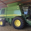 John Deere 9860 with 936 D Front and 914 Pickup front 