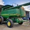 JOHN DEERE 9750 STS WITH 936D 36 FOOT DRAPER FRONT ON TRAILER FOR SALE