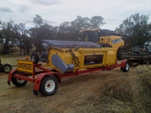 2010 Phillips Rollerdown Pickup Canola Front with trailer