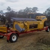 2010 Phillips Rollerdown Pickup Canola Front with trailer