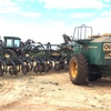 John Deere 40 Foot 12 inch space air seeder with Simplicity Air Cart.