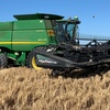 2009 John Deere 9670 STS with D60 40ft Macdon Front