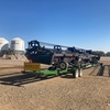 John Deere 9770 with 2016 40’ D65 MacDon Front on Coolaman Trailer