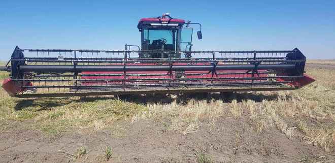 Case WDX 1701 Windrower with 30' Front on Comb Trailer