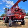 Case 2188 with 960 Macdon Front with Trailer