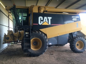 Cat Lexion 480 R including MacDon 962 front and trailer.